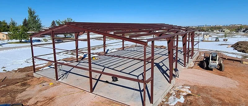 What is the Difference Between Red Iron Steel and Light-Gauge Steel?